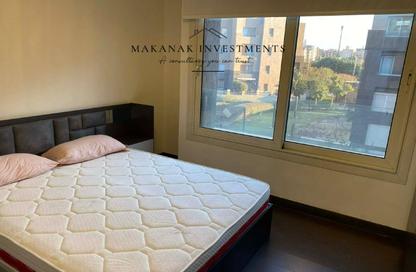 Apartment - 2 Bedrooms - 2 Bathrooms for sale in Palm Hills Village Gate - South Investors Area - New Cairo City - Cairo