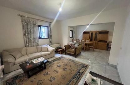 Apartment - 2 Bedrooms - 2 Bathrooms for sale in Arafat St. - Dokki - Giza