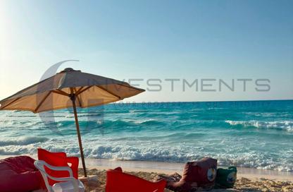 Chalet - 3 - 2 for sale in Marina Flowers - Markaz Al Hamam - North Coast