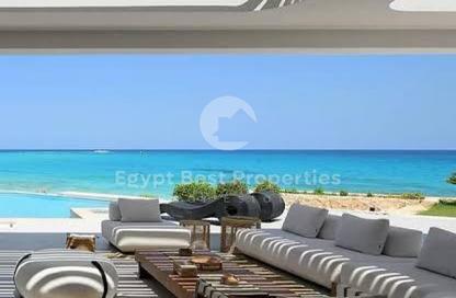 Chalet - 2 Bedrooms - 2 Bathrooms for sale in Beit Al Bahr - Sidi Heneish - North Coast