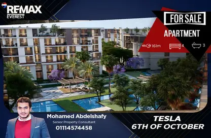 Apartment - 4 Bedrooms - 3 Bathrooms for sale in Tesla Residence - Al Wahat Road - 6 October City - Giza