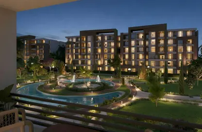 Apartment - 2 Bedrooms - 2 Bathrooms for sale in Garden Gate - Ashgar City - Al Wahat Road - 6 October City - Giza