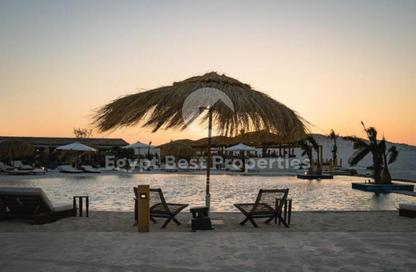 Chalet - 2 Bedrooms - 2 Bathrooms for sale in Ramla Lakeside - Qesm Ad Dabaah - North Coast Chalet - 2 Bedrooms - 2 Bathrooms for sale in Ramla Lakeside - Qesm Ad Dabaah - North Coast