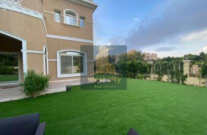 Villa - 6 Bedrooms - 5 Bathrooms for sale in Mena Garden City - Al Motamayez District - 6 October City - Giza