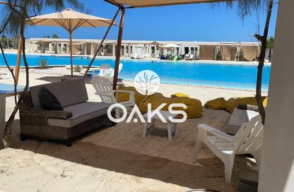 Chalet - 2 Bedrooms - 2 Bathrooms for sale in Hacienda Waters - Qesm Ad Dabaah - North Coast