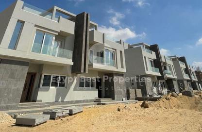 Villa - 4 - 4 for sale in O West - 6 October Compounds - 6 October City - Giza