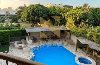 Villa - 6 Bedrooms - 6 Bathrooms for rent in Mena Garden City - Al Motamayez District - 6 October City - Giza