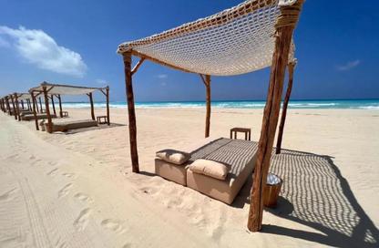 Chalet - 3 Bedrooms - 4 Bathrooms for sale in Beit Al Bahr - Sidi Heneish - North Coast Chalet - 3 Bedrooms - 4 Bathrooms for sale in Beit Al Bahr - Sidi Heneish - North Coast