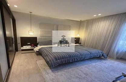 Apartment - 2 Bedrooms - 2 Bathrooms for sale in Palm Hills Village Gate - South Investors Area - New Cairo City - Cairo