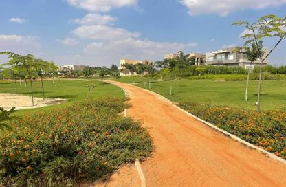 Villa - 5 Bedrooms - 6 Bathrooms for sale in New Giza - Cairo Alexandria Desert Road - 6 October City - Giza