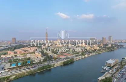 Apartment - 5 Bedrooms - 6 Bathrooms for sale in Nile St. - Dokki - Giza