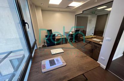 Office Space - Studio - 2 Bathrooms for rent in Arkan Plaza - 26th of July Corridor - Sheikh Zayed City - Giza
