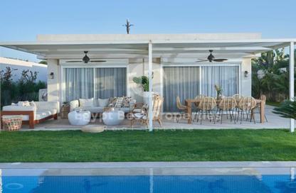 Townhouse - 3 Bedrooms - 4 Bathrooms for sale in Beit Al Bahr - Sidi Heneish - North Coast