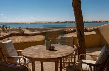 Chalet - 4 Bedrooms - 6 Bathrooms for sale in Ramla - Ras Al Hekma - North Coast
