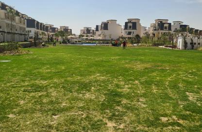 Townhouse - 4 - 4 for sale in Mountain View Chill Out Park - Northern Expansions - 6 October City - Giza