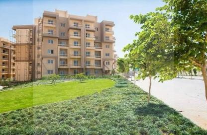 Apartment - 2 Bedrooms - 2 Bathrooms for sale in Garden Gate - Ashgar City - Al Wahat Road - 6 October City - Giza