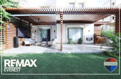 Villa - 4 Bedrooms - 5 Bathrooms for sale in Greens - 6th District - Sheikh Zayed City - Giza