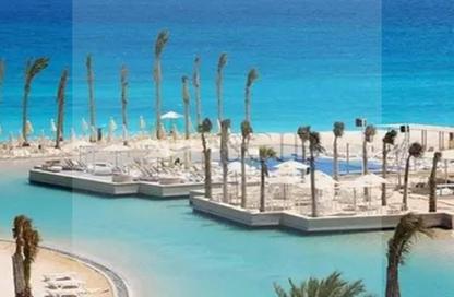 Chalet - 2 Bedrooms - 2 Bathrooms for sale in Hacienda Waters - Qesm Ad Dabaah - North Coast