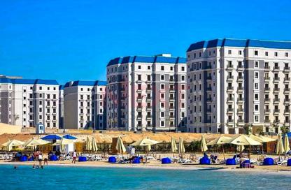 Chalet - 2 Bedrooms - 2 Bathrooms for sale in Latin District - New Alamein City - Al Alamein - North Coast