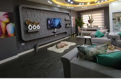 Apartment - 4 Bedrooms - 3 Bathrooms for sale in Al Bostan St. - 9th District - Sheikh Zayed City - Giza