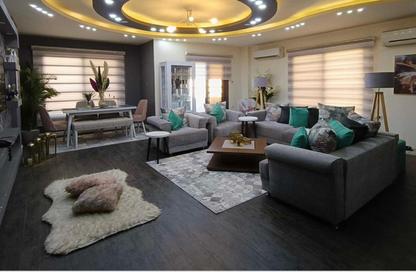 Apartment - 4 Bedrooms - 3 Bathrooms for sale in Al Bostan St. - 9th District - Sheikh Zayed City - Giza
