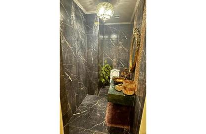Apartment - 4 Bedrooms - 4 Bathrooms for sale in West Somid - 6 October City - Giza