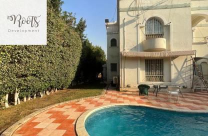 Villa - 5 Bedrooms - 6 Bathrooms for sale in Rawda - Al Wahat Road - 6 October City - Giza