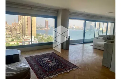 Apartment - 3 Bedrooms - 3 Bathrooms for rent in Nile St. - Dokki - Giza