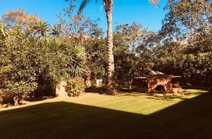 Villa - 7 Bedrooms - 6 Bathrooms for sale in Green Heights - 26th of July Corridor - 6 October City - Giza