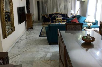 Apartment - 3 Bedrooms - 3 Bathrooms for sale in Al Madina El Monawara St. - Mohandessin - Giza