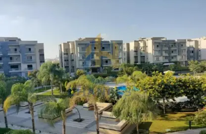 Apartment - 2 Bedrooms - 2 Bathrooms for sale in Galleria Moon Valley - South Investors Area - New Cairo City - Cairo