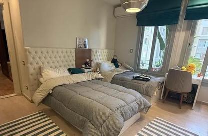 Apartment - 2 Bedrooms - 2 Bathrooms for sale in Palm Hills Village Gate - South Investors Area - New Cairo City - Cairo