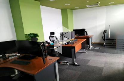 Office Space - Studio - 2 Bathrooms for rent in Cairo Festival City - North Investors Area - New Cairo City - Cairo
