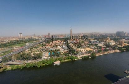 Office Space - Studio - 2 Bathrooms for rent in Nile Corniche St. - Garden City - Cairo