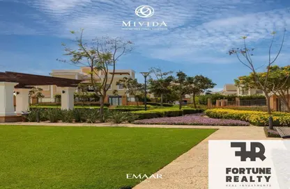 Villa - 6 Bedrooms - 5 Bathrooms for sale in Mivida - 5th Settlement Compounds - The 5th Settlement - New Cairo City - Cairo