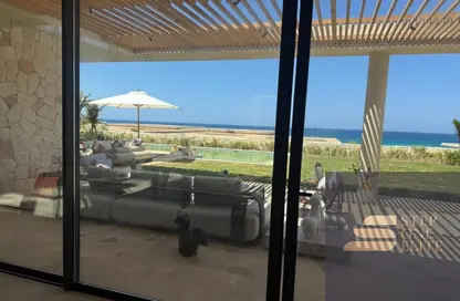 Chalet - 2 Bedrooms - 2 Bathrooms for sale in Ramla Lakeside - Qesm Ad Dabaah - North Coast