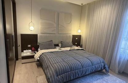 Apartment - 2 Bedrooms - 2 Bathrooms for sale in Palm Hills Village Gate - South Investors Area - New Cairo City - Cairo