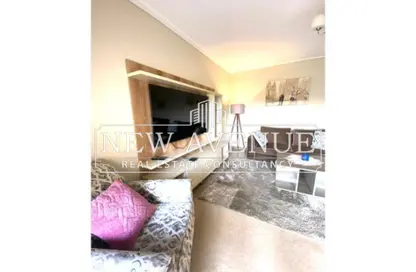 Apartment - 2 Bedrooms - 3 Bathrooms for sale in Amberville - 6 October City - Giza