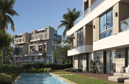 Apartment - 2 Bedrooms - 2 Bathrooms for sale in Aqmar - Al Wahat Road - 6 October City - Giza