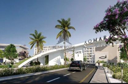 Apartment - 2 Bedrooms - 2 Bathrooms for sale in Aqmar - Al Wahat Road - 6 October City - Giza