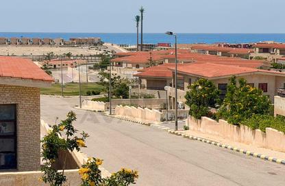 Villa - 4 Bedrooms - 2 Bathrooms for sale in Cairo University Village - Markaz Al Hamam - North Coast Villa - 4 Bedrooms - 2 Bathrooms for sale in Cairo University Village - Markaz Al Hamam - North Coast
