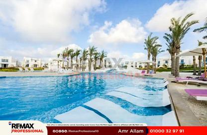 Chalet - 2 Bedrooms - 3 Bathrooms for sale in Hacienda Waters - Qesm Ad Dabaah - North Coast