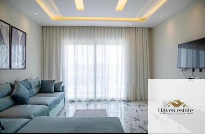 Apartment - 1 Bedroom - 1 Bathroom for rent in The Residences - New Cairo City - Cairo
