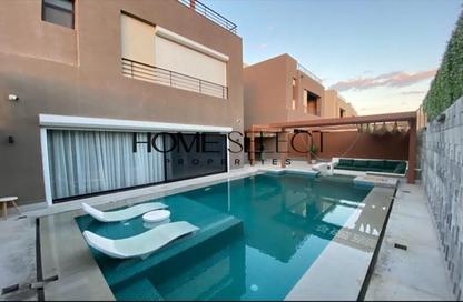 Villa - 3 - 5 for sale in The Crown - Cairo Alexandria Desert Road - 6 October City - Giza