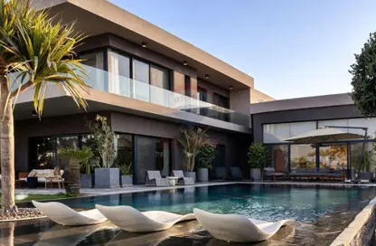 Villa - 4 Bedrooms - 5 Bathrooms for sale in New Giza - Cairo Alexandria Desert Road - 6 October City - Giza