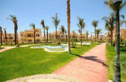 Twin House - 5 Bedrooms - 4 Bathrooms for sale in Greens - 6th District - Sheikh Zayed City - Giza