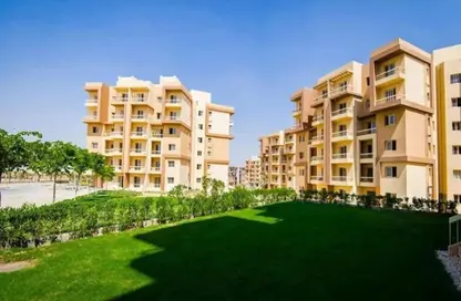 Apartment - 2 Bedrooms - 2 Bathrooms for sale in Garden Gate - Ashgar City - Al Wahat Road - 6 October City - Giza