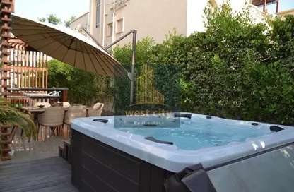 Villa - 4 Bedrooms - 4 Bathrooms for sale in Greens - 6th District - Sheikh Zayed City - Giza