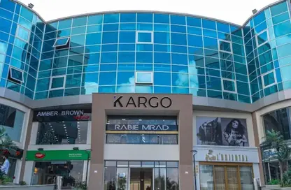 محل تجاري - استوديو - 2 حمامات للبيع في كارجو مول - شارع الشباب - الشيخ زايد - الجيزة