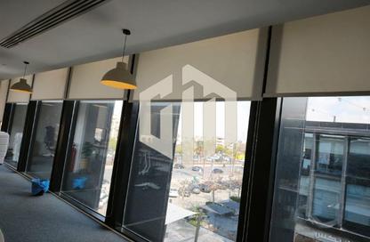 Office Space - Studio - 4 Bathrooms for rent in The Water Way - North Investors Area - New Cairo City - Cairo